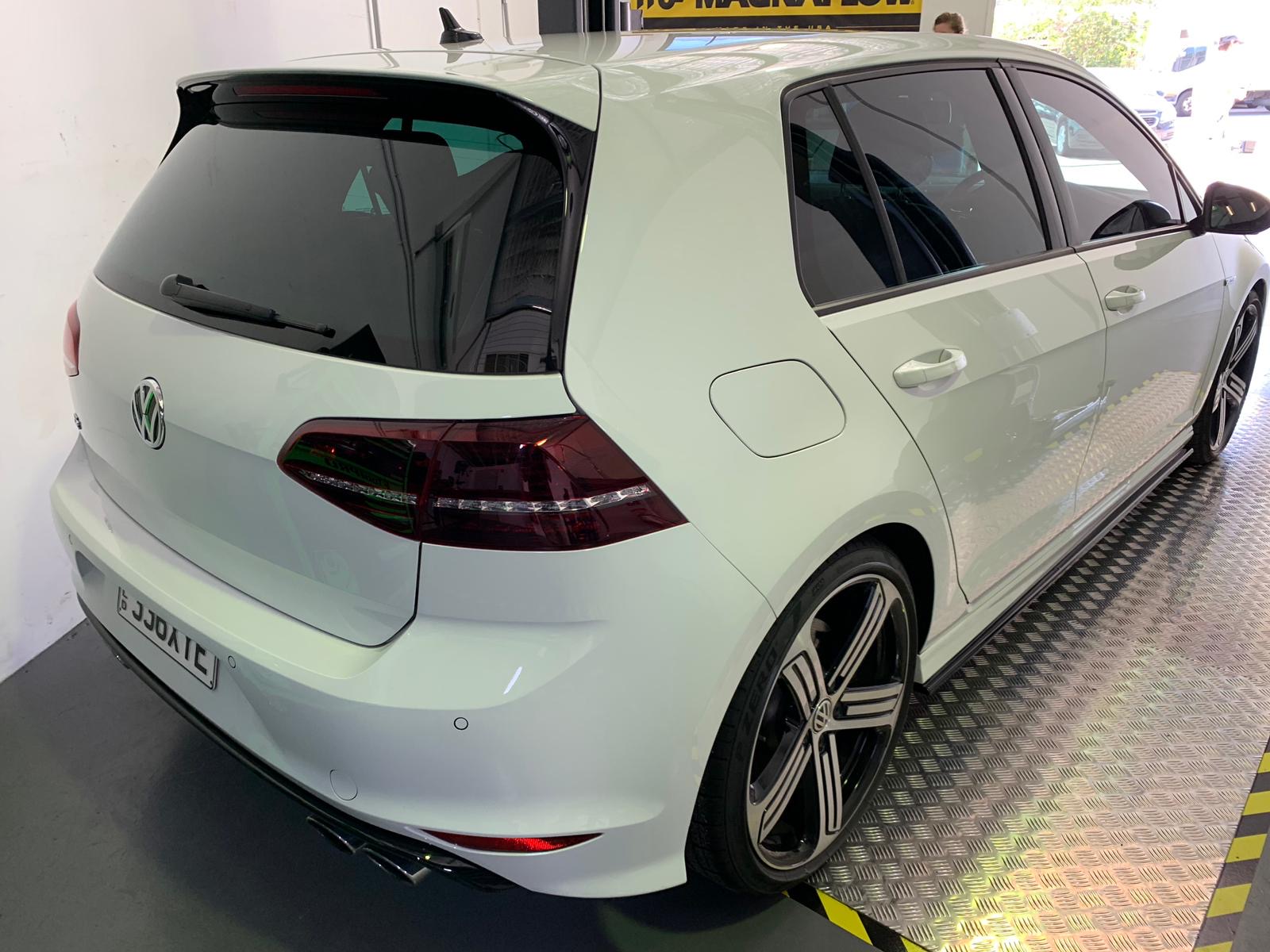 White VW Golf 7R on checker plate in the DNA workshop